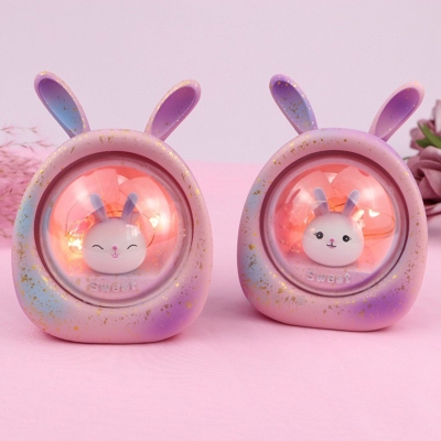 Resin Rabbit in Capsule Nightstand Lamp Kids Battery Powered LED Table Light in Pink/Purple