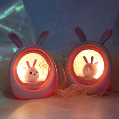 Resin Rabbit in Capsule Nightstand Lamp Kids Battery Powered LED Table Light in Pink/Purple