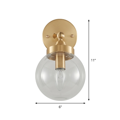 Simplicity Globe Clear Glass Wall Lamp Single-Bulb Wall Mounted Light with Rotatable Design in Brass