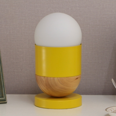Macaron 1 Bulb Nightstand Light Yellow and Wood Splicing Capsule Table Lamp with Milk Glass Shade
