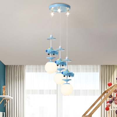 Cartoon Jet Multi Light Pendant Opal Ball Glass 3/5 Bulbs Bedroom Hanging Light Fixture in Pink/Blue