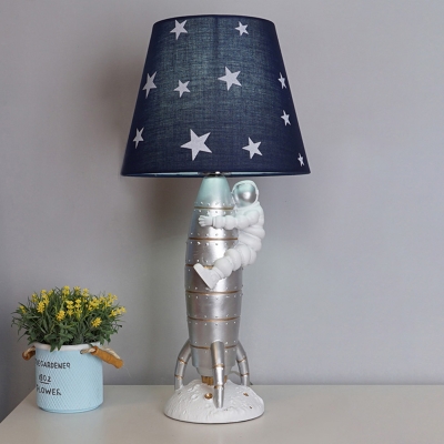 Kids 1-Head Night Lamp Silver Spaceman Hug The Rocket Table Light with Fabric Shade