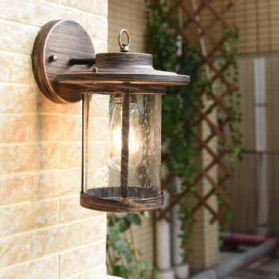 Clear Ripple Glass Cylinder Wall Lamp Traditional 1 Light Outdoor Wall Light Fixture in Bronze