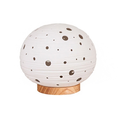 Hollowed Out Ovoid Mini Night Lamp Simple Ceramic Single White Table Light with Wood Base