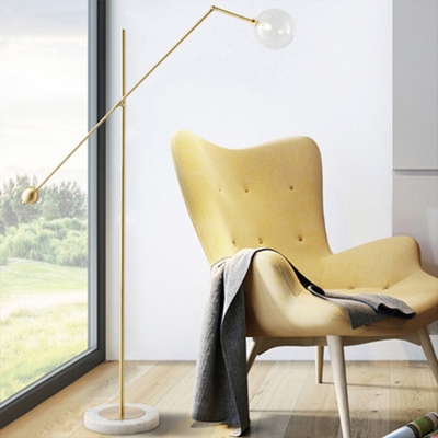 Metallic Balance Arm Standing Floor Light Post Modern 1 Light Gold Finish Floor Lamp with Ball Clear Glass Shade