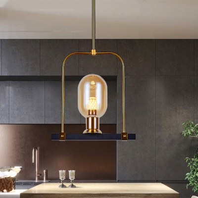 1 Light Dining Room Hanging Light Modern Black and Gold Pendulum Lamp with Oval Amber Glass Shade