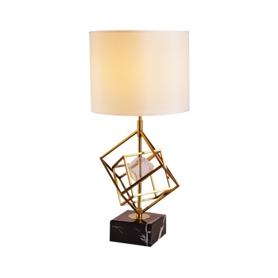 Cylinder Fabric Table Lighting Postmodern 1 Light Black-Gold Night Lamp with Interlocked Cube Decor