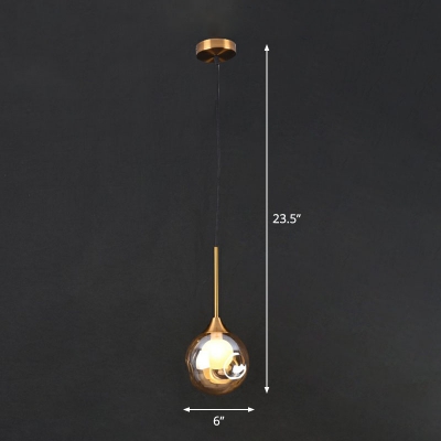 Dimpled Glass Ball Suspension Light Postmodern 1-Light Brass Finish Hanging Pendant over Table