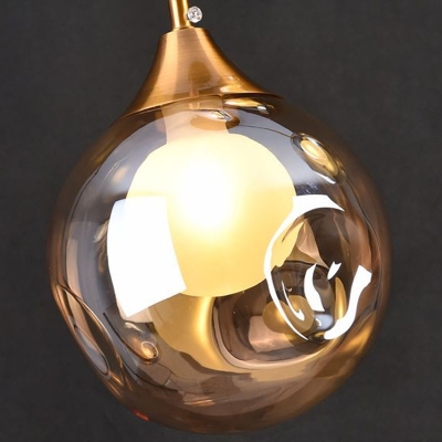 Dimpled Glass Ball Suspension Light Postmodern 1-Light Brass Finish Hanging Pendant over Table