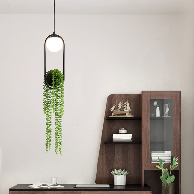 Artistic Ball Pendulum Lamp Cream Glass 1-Bulb Restaurant Hanging Light in Black with Artificial Vine