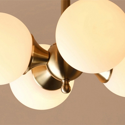 White Glass Ball Semi Flushmount Modern 4 Lights Semi Flush Lighting in Gold with Crossed Lines Design