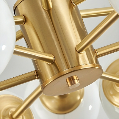 Elegant Brass Chandelier with White Glass Shades and Modern Globe Design