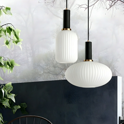Modern Clear Glass Pendant with Adjustable Cord Mounting and Multiple Lighting Options