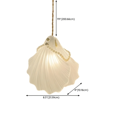 Modern Clear Glass Pendant Light with Adjustable Hanging Length and Unique Round Canopy