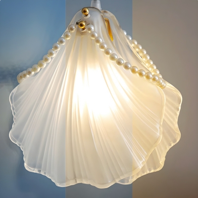 Modern Clear Glass Pendant Light with Adjustable Hanging Length and Unique Round Canopy