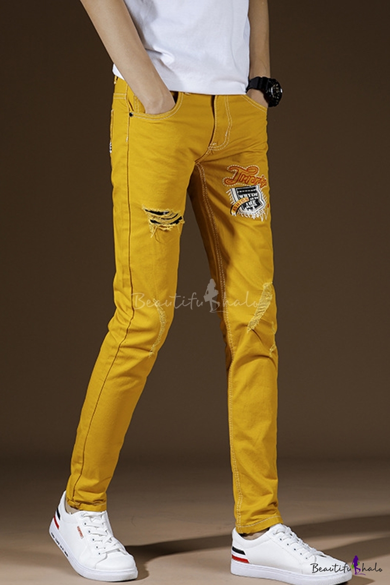 yellow ripped jeans mens