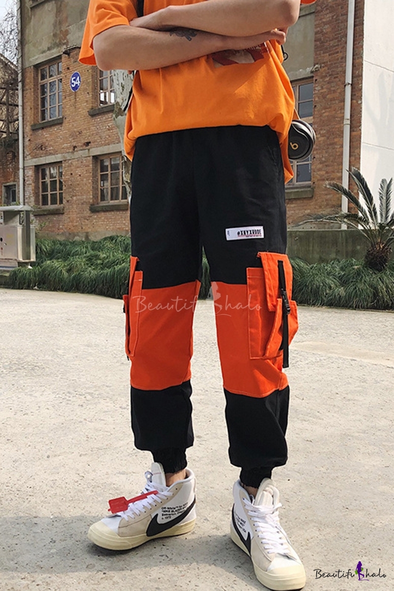 black and orange cargo pants