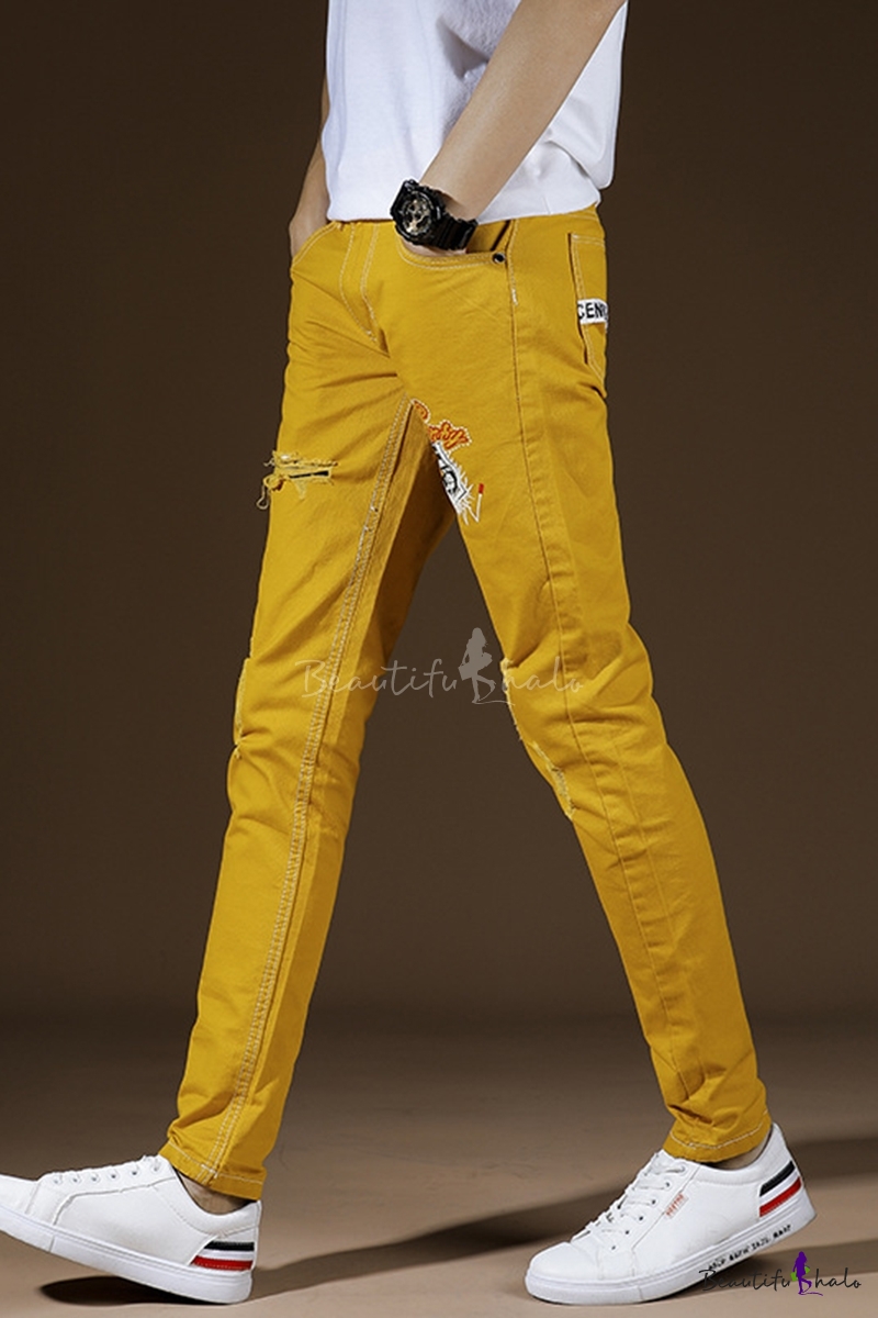 yellow ripped jeans mens