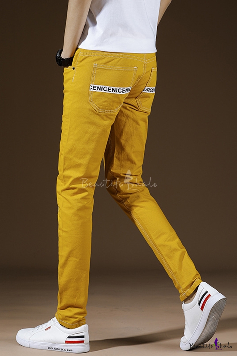 yellow ripped jeans mens