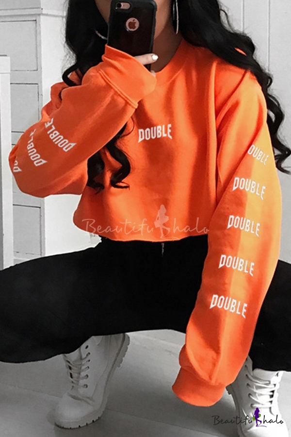 cropped orange sweatshirt