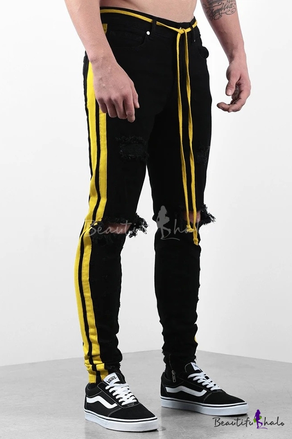 yellow pants with black side stripe