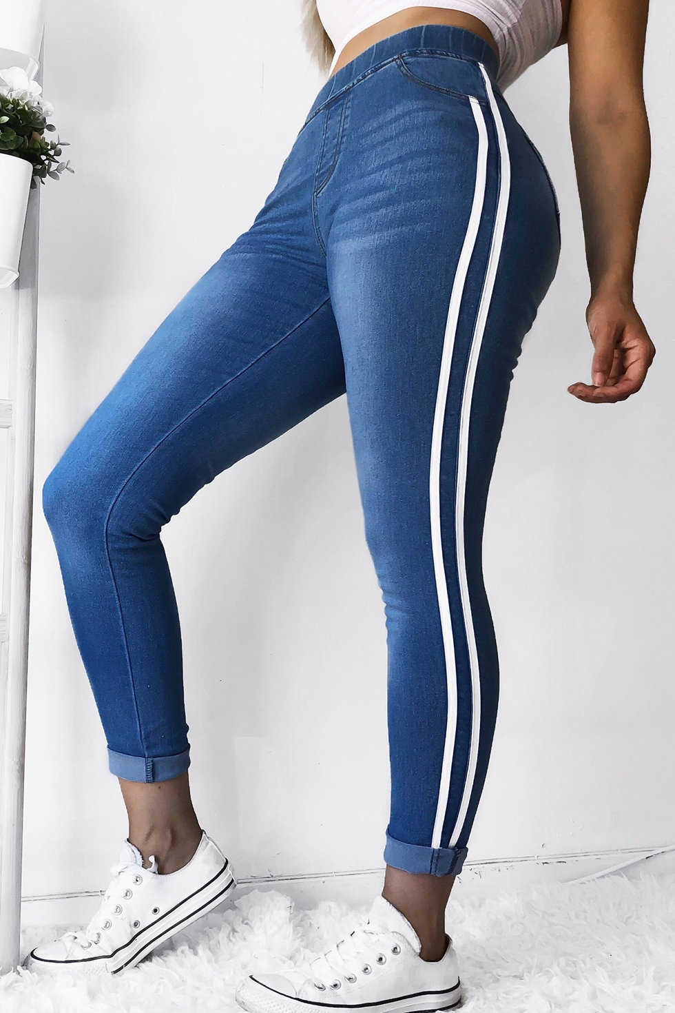 jeans with red and white stripe on the side